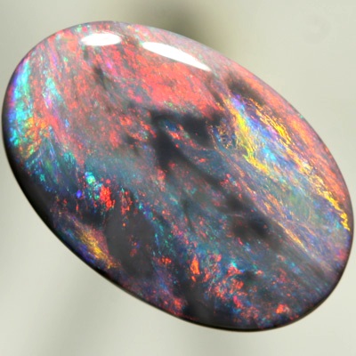 SOLID BLACK OPAL Red shades contrasts with turquoise sea colours. SEE VIDEO
